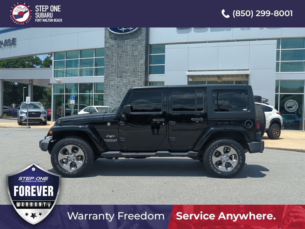 Used 2017 Black Jeep Unlimited Sahara image 4