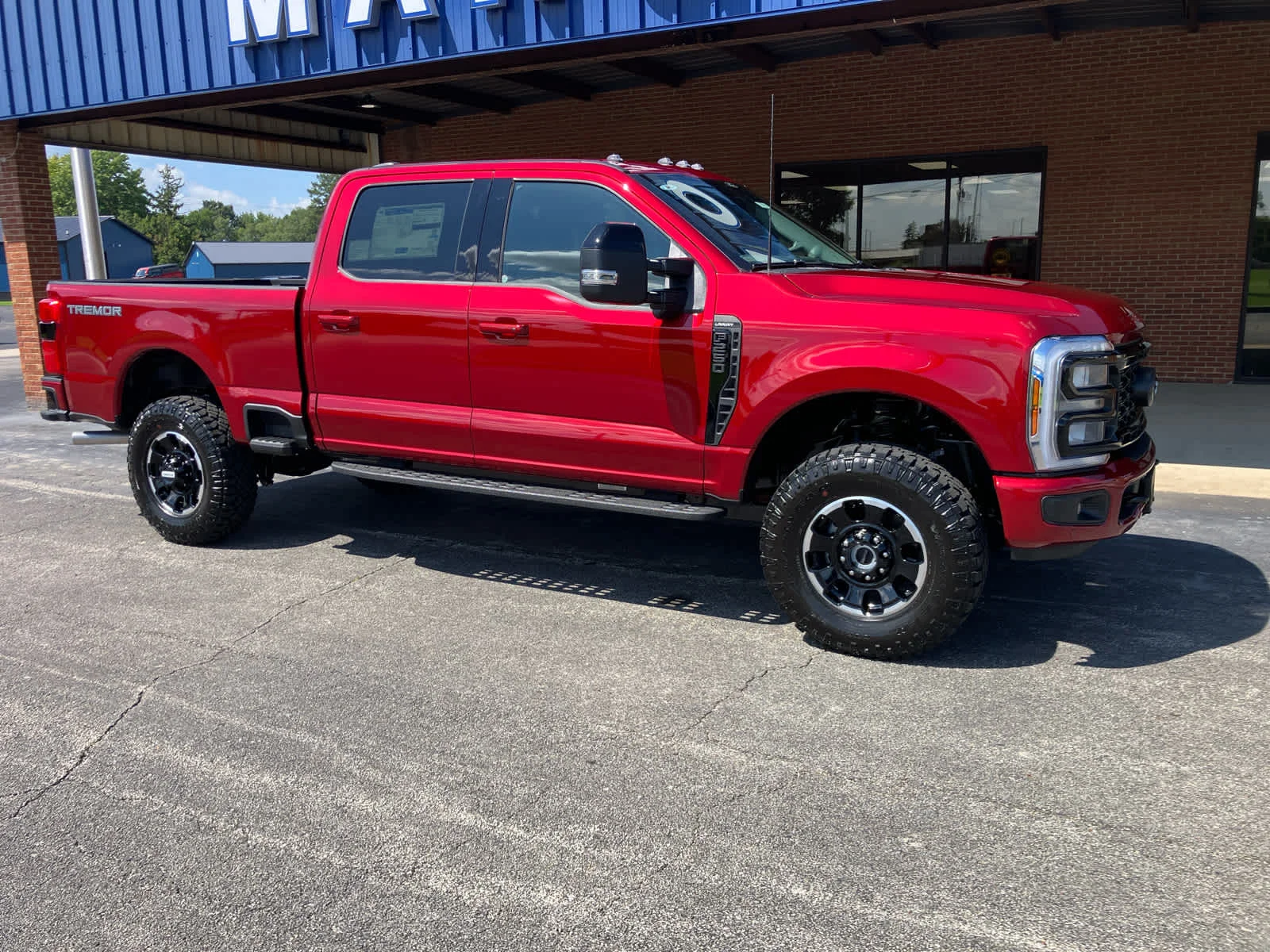 Used 2026 Ruby Red Metallic Tinted Clearcoat Ford LARIAT image 2
