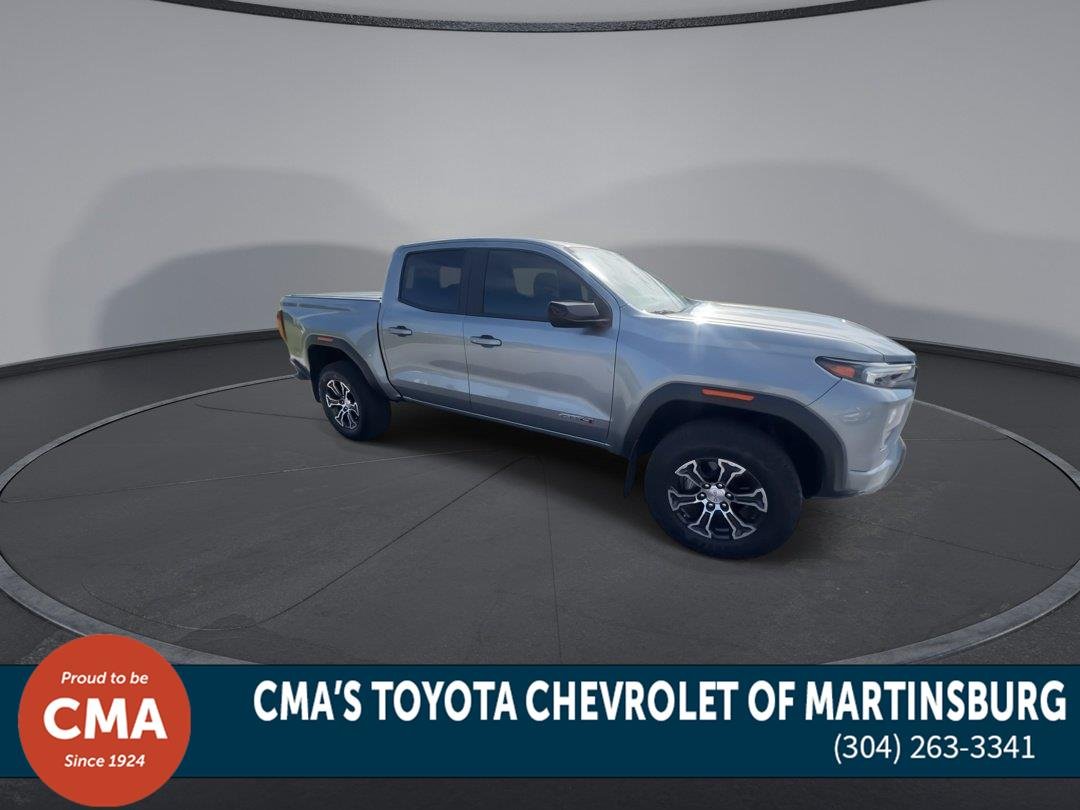 Used 2025 Sterling Metallic GMC 4WD AT4 image 2