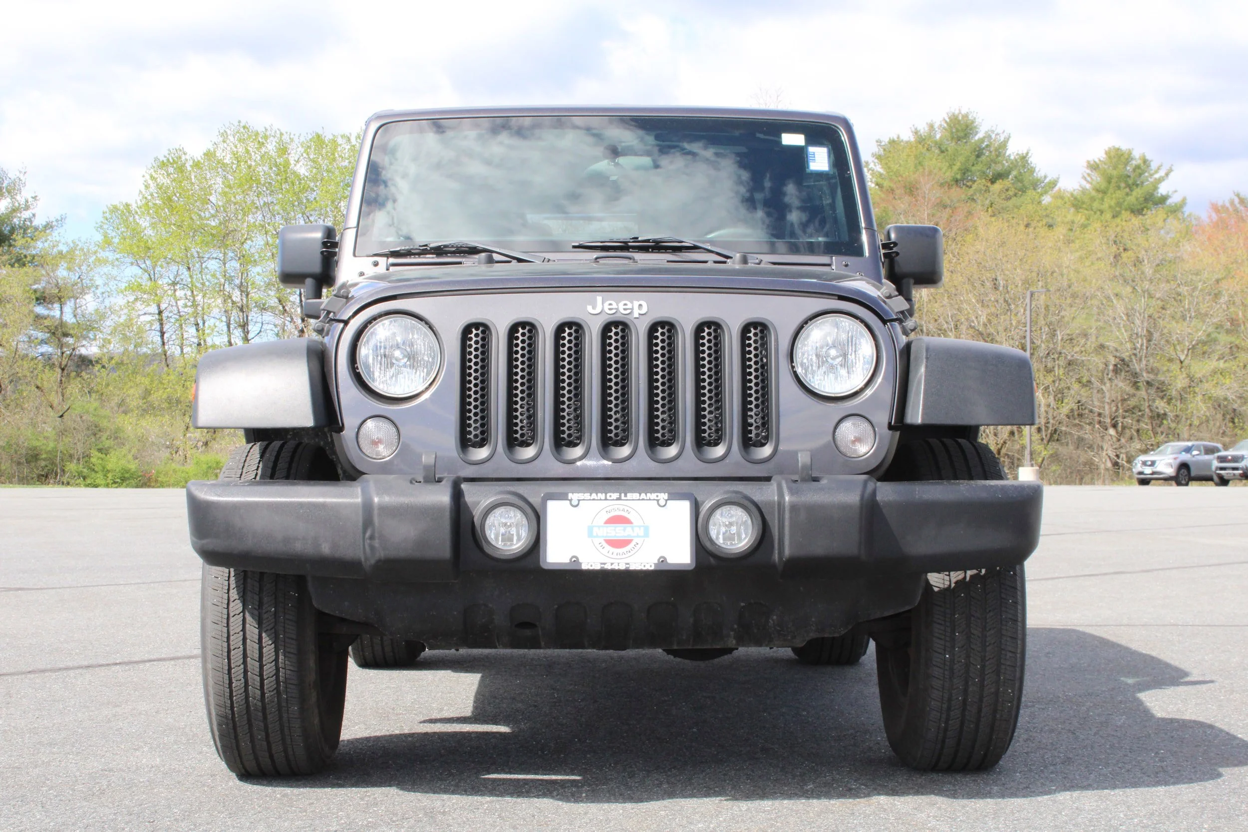 Used 2017 Granite Crystal Metallic Clearcoat Jeep Sport image 2