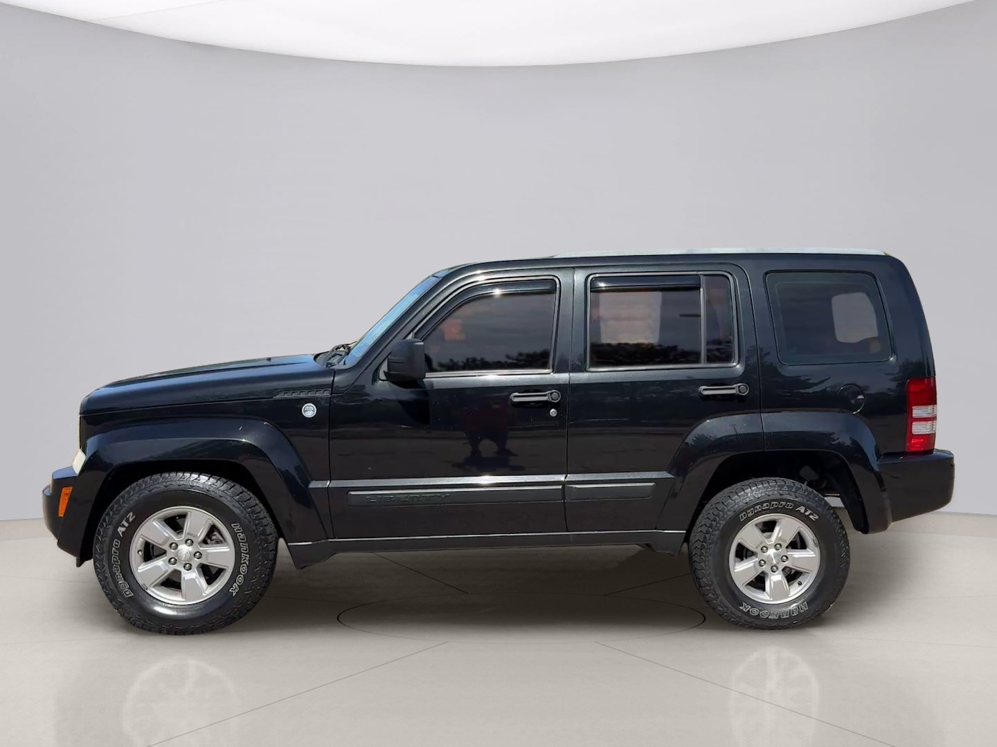 Used 2011 Black Jeep SPORT image 2