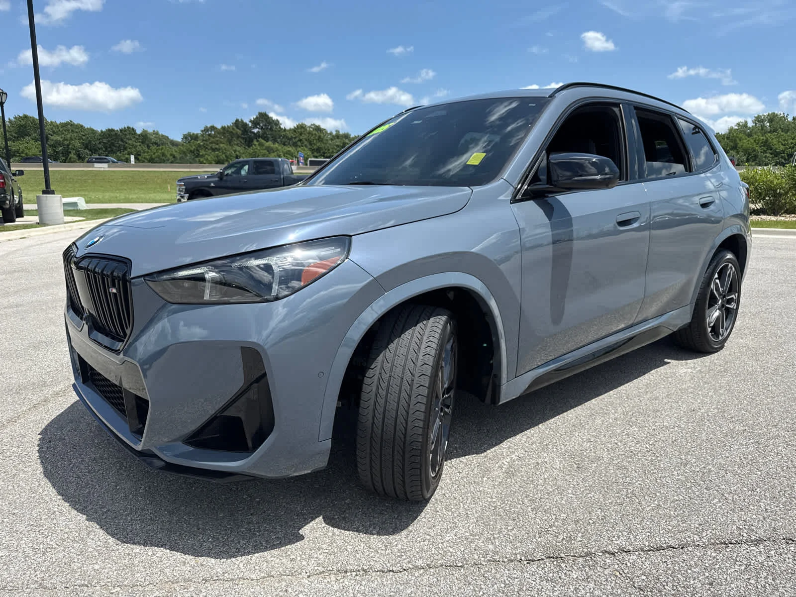 Used 2025 Storm Bay Metallic BMW M35i image 4