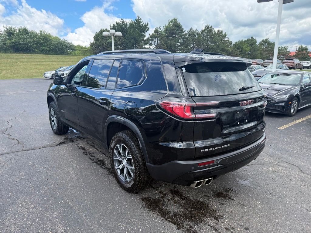 Used 2024 Ebony Twilight Metallic GMC AT4 image 2
