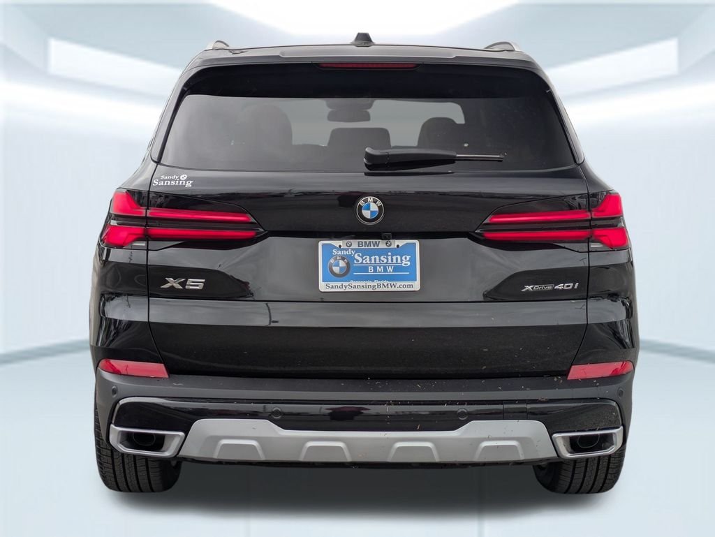 New 2026 Black Sapphire Metallic BMW xDrive40i image 4