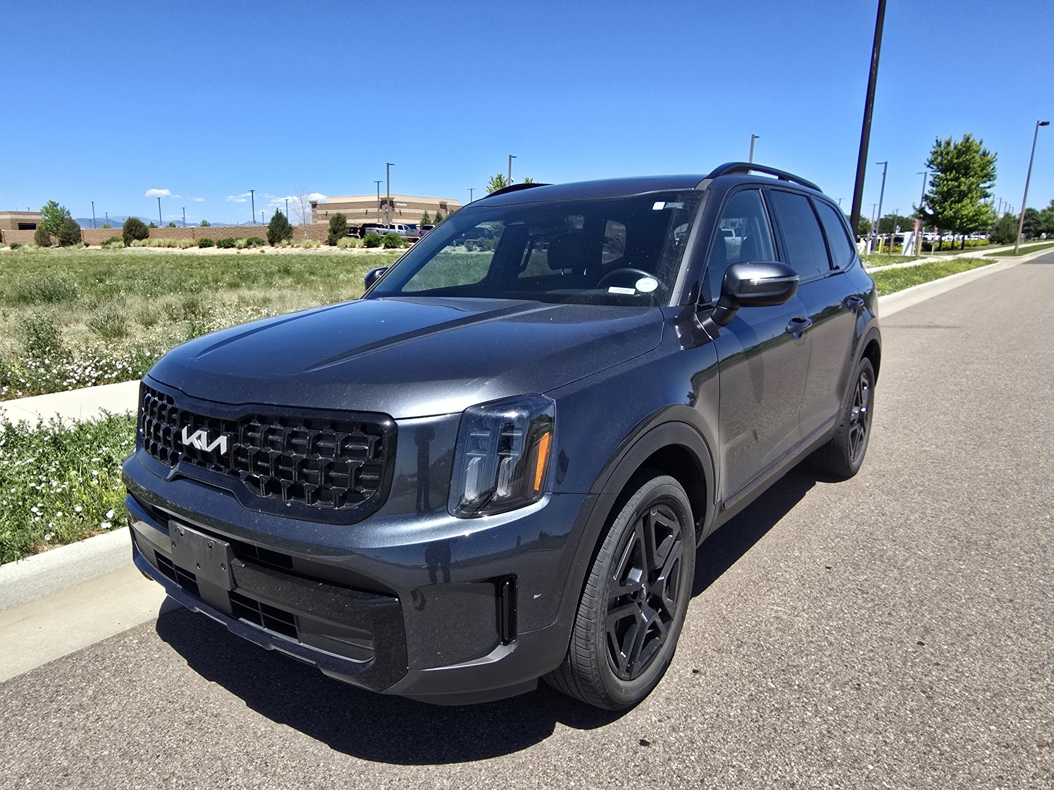 Used 2024 Gravity Gray Kia EX X-Line image 1