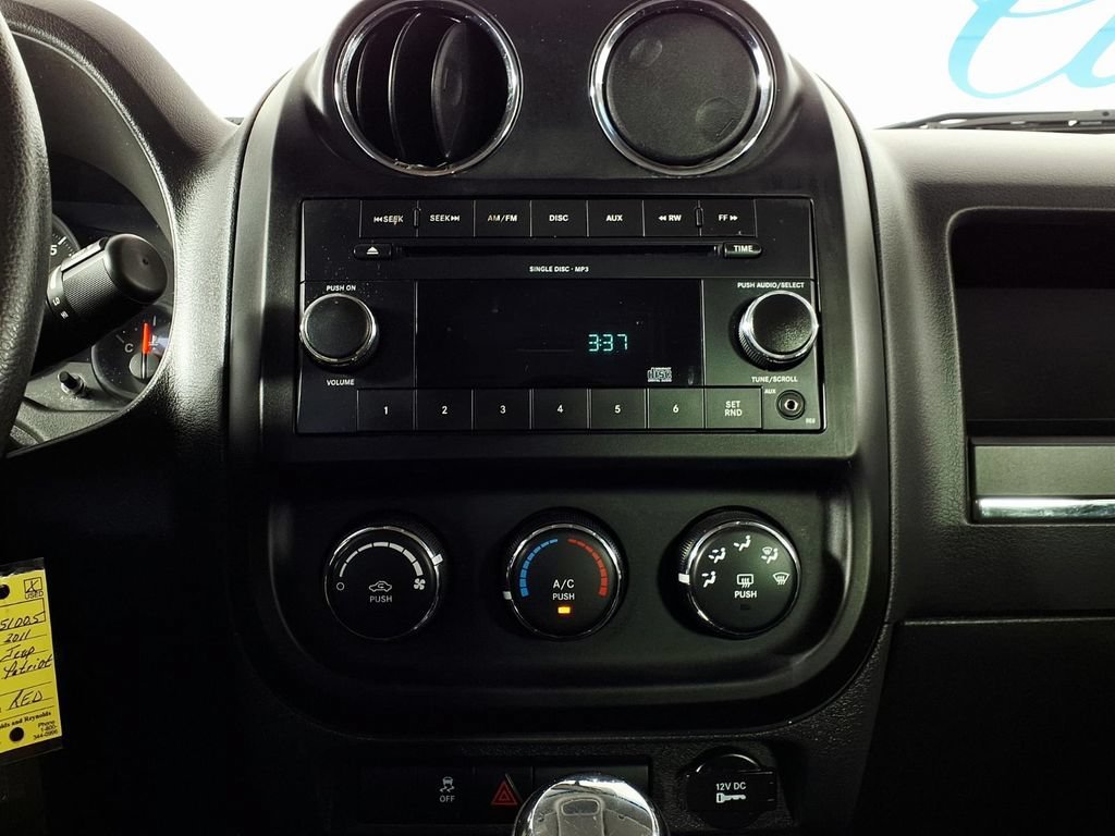 Used 2011 Deep Cherry Red Jeep Sport image 22