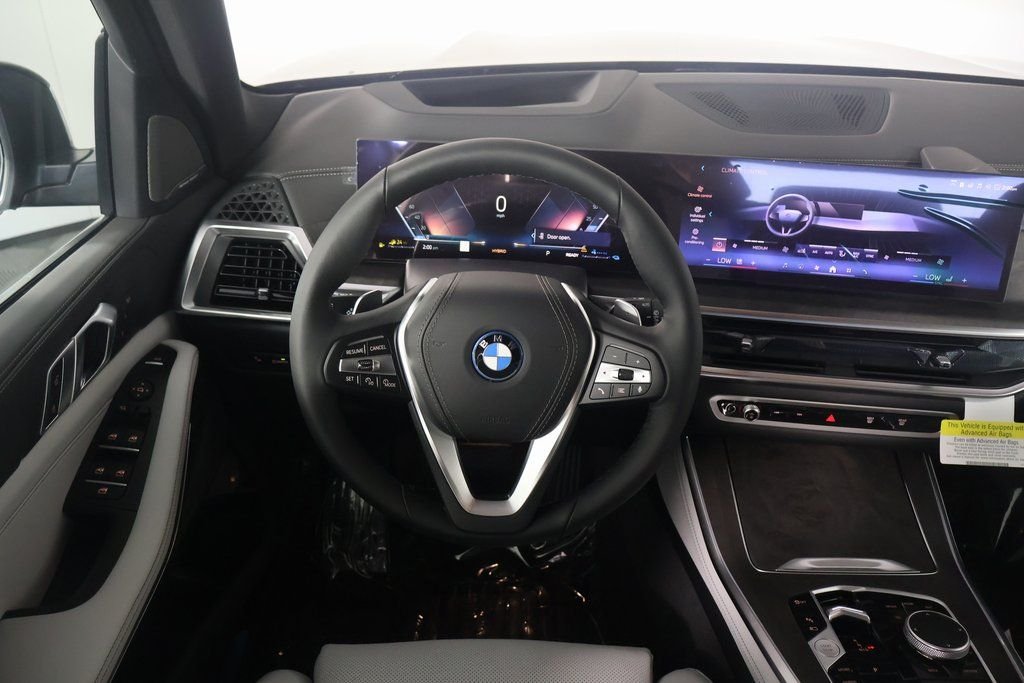 Used 2026 Black Sapphire Metallic BMW xDrive50e image 3