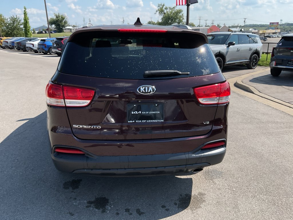 Used 2016 Dark Cherry Kia LX image 8