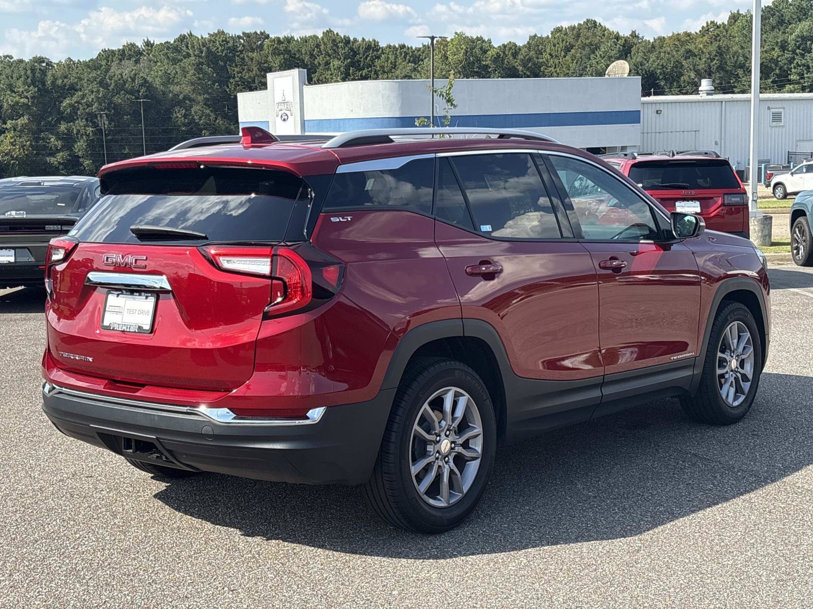 Used 2024 Volcanic Red Tintcoat GMC SLT image 5