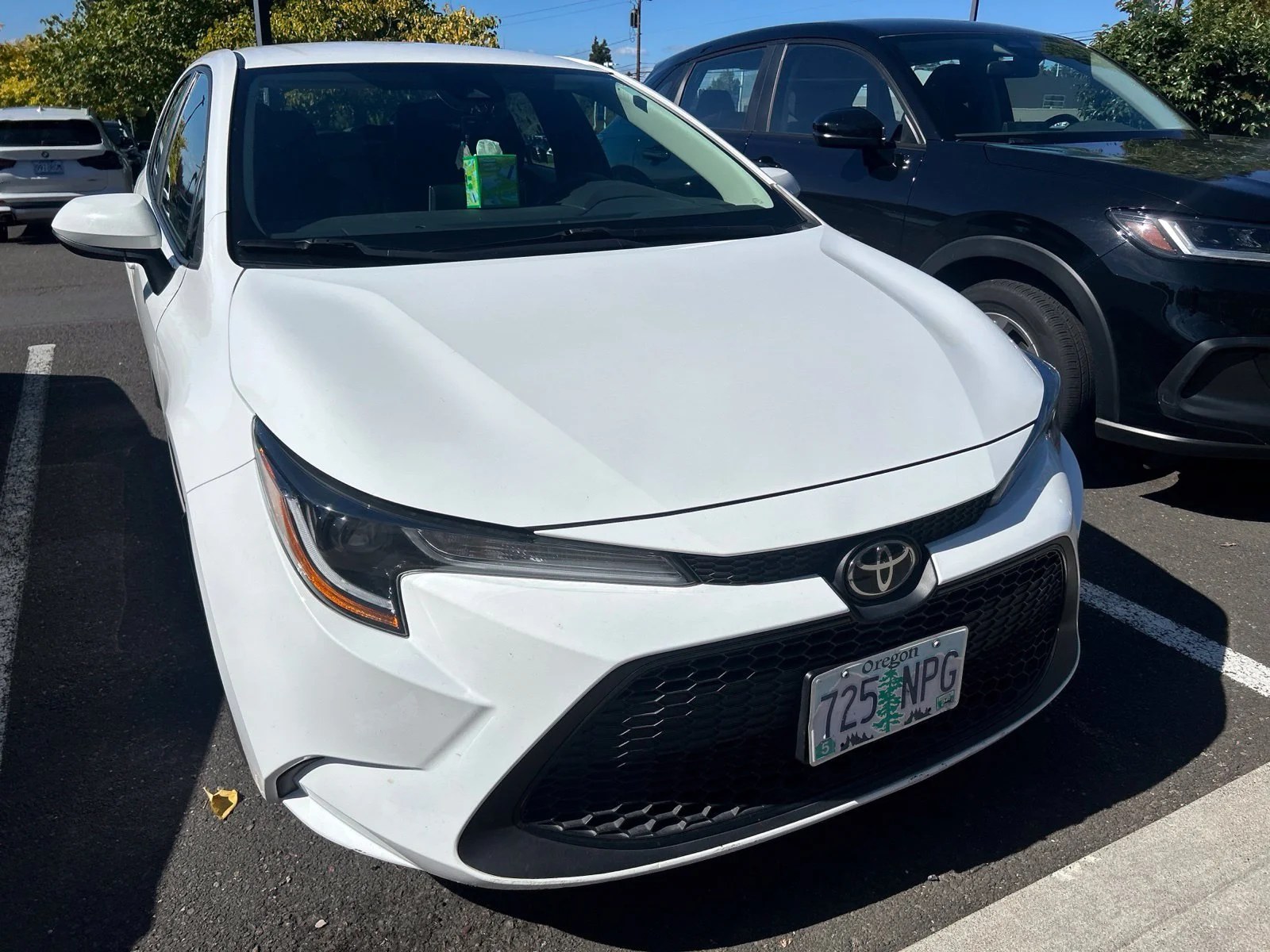 Used 2021 Super White Toyota LE image 3