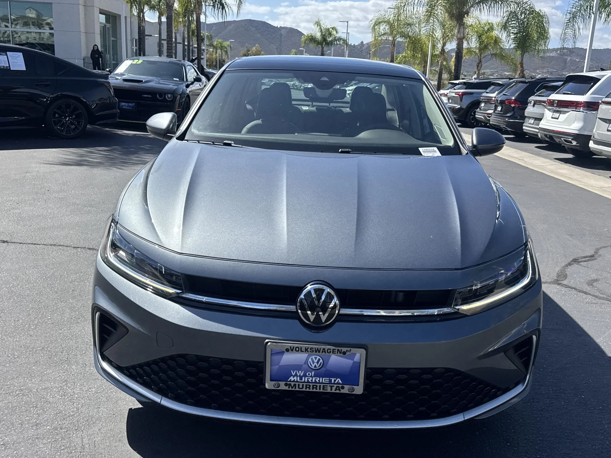Certified Used 2025 Platinum Gray Metallic Volkswagen SE image 1