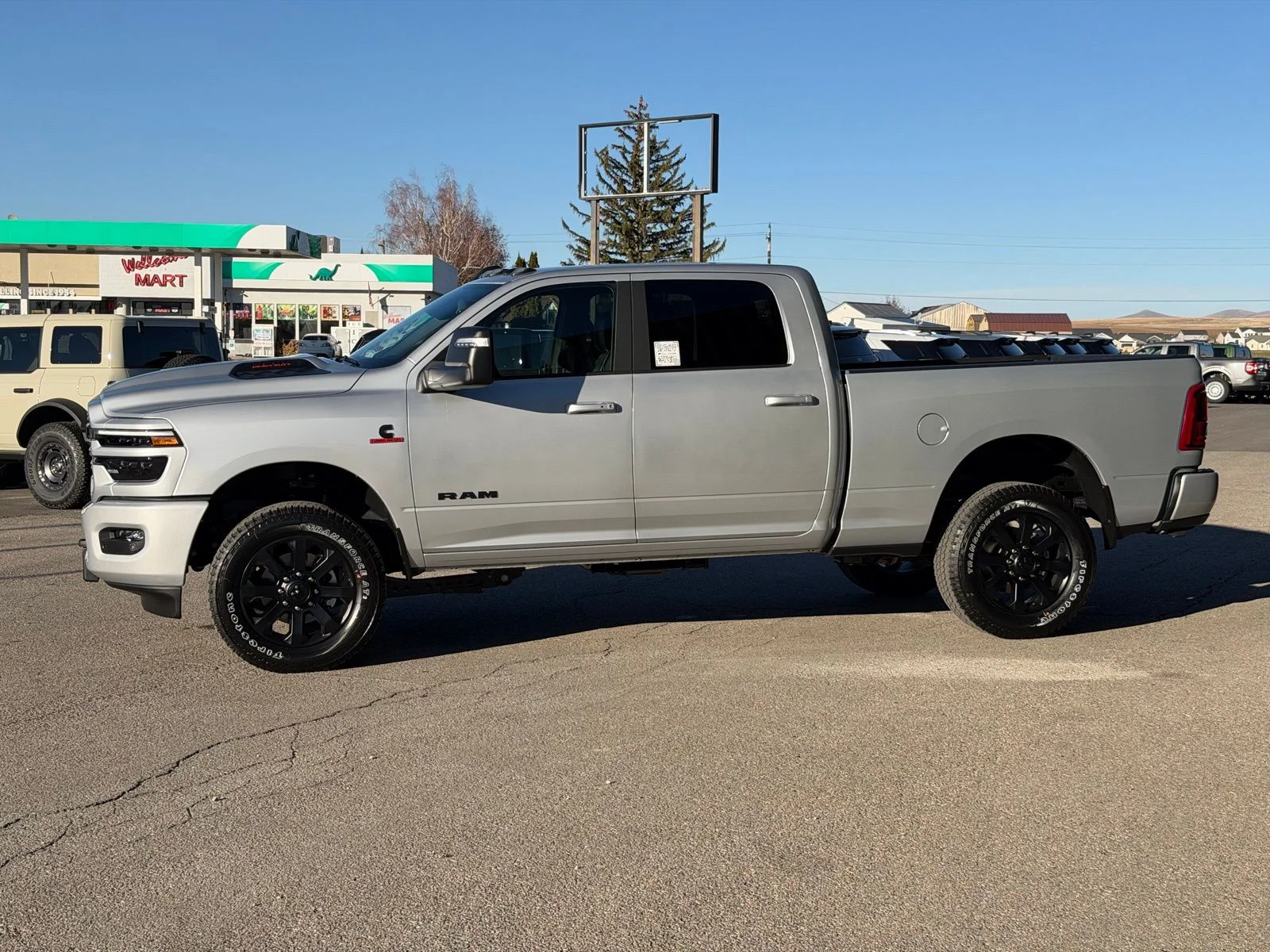 New 2026 Silver-Zynith Exterior Paint RAM Laramie image 11