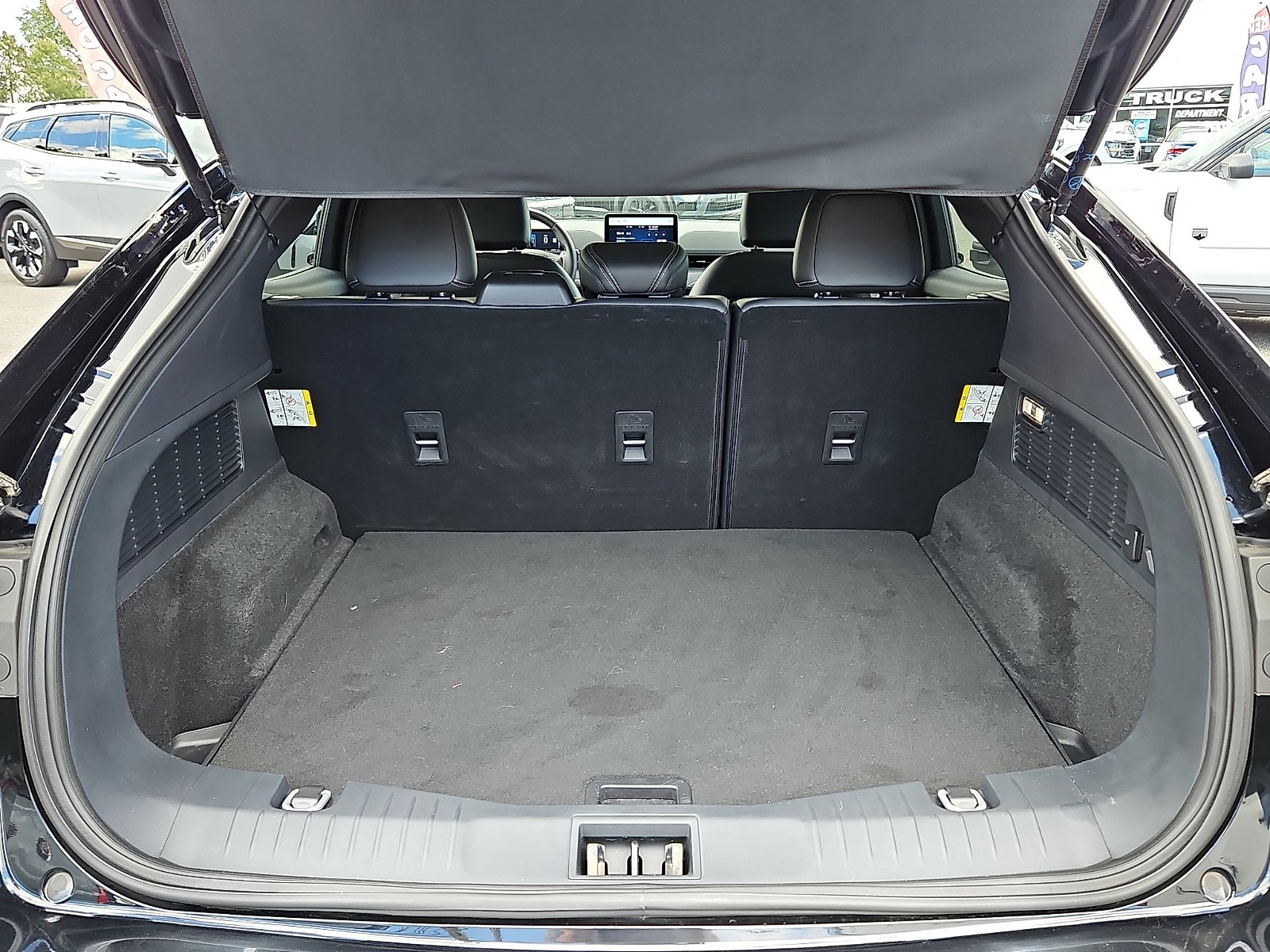Used 2024 Shadow Black Ford Select image 28