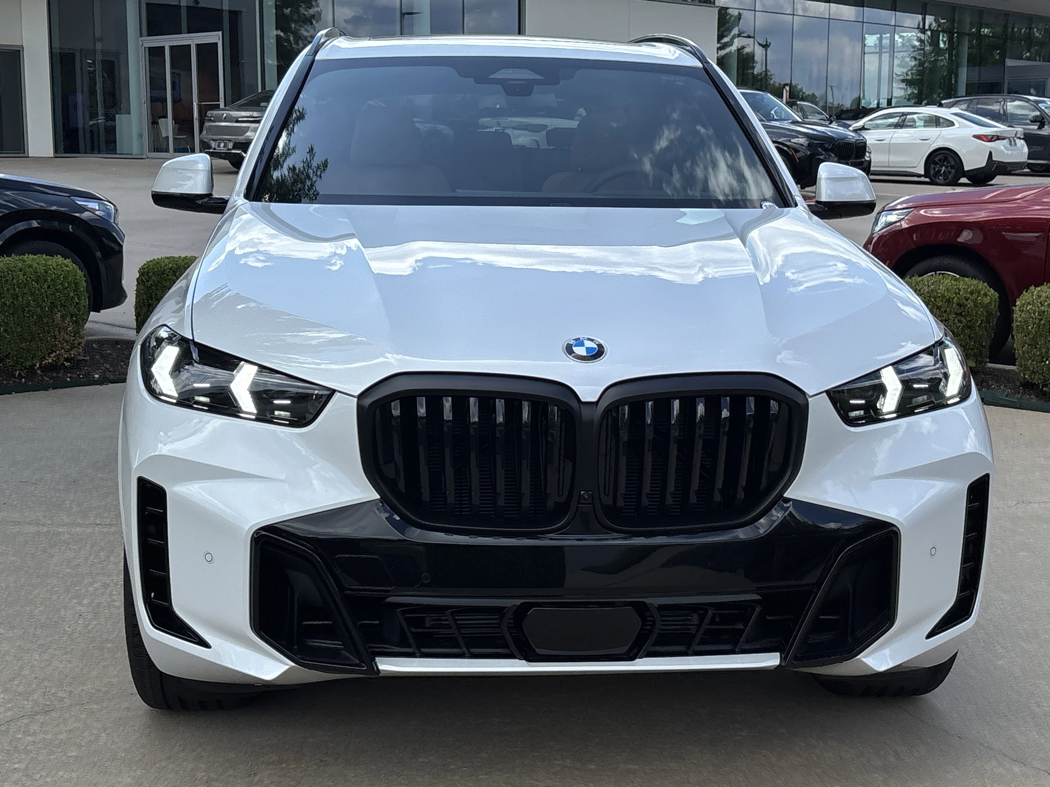 New 2026 MINERAL WHITE BMW xDrive40i image 14