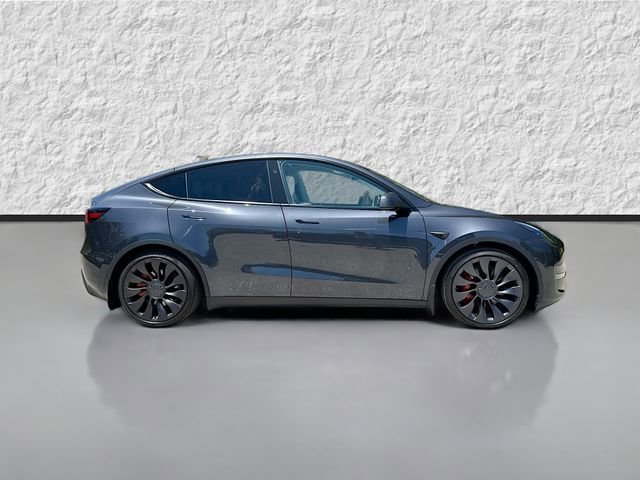 Used 2024 Tesla Model Y Performance with VIN 7SAYGDEFXRA320802 for sale in Sarasota, FL