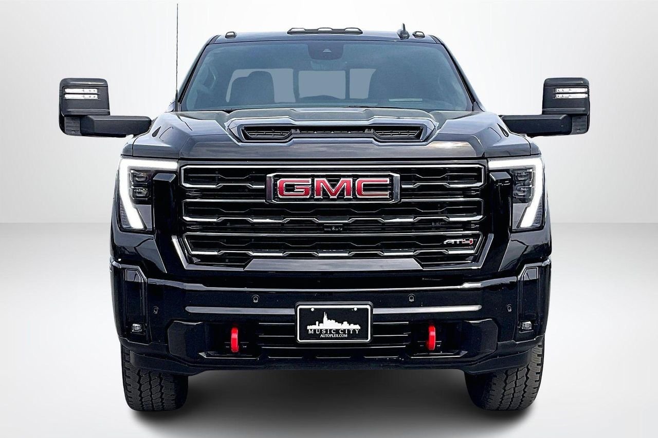Used 2025 Onyx Black GMC 4WD Crew Cab Standard Bed AT4 image 2