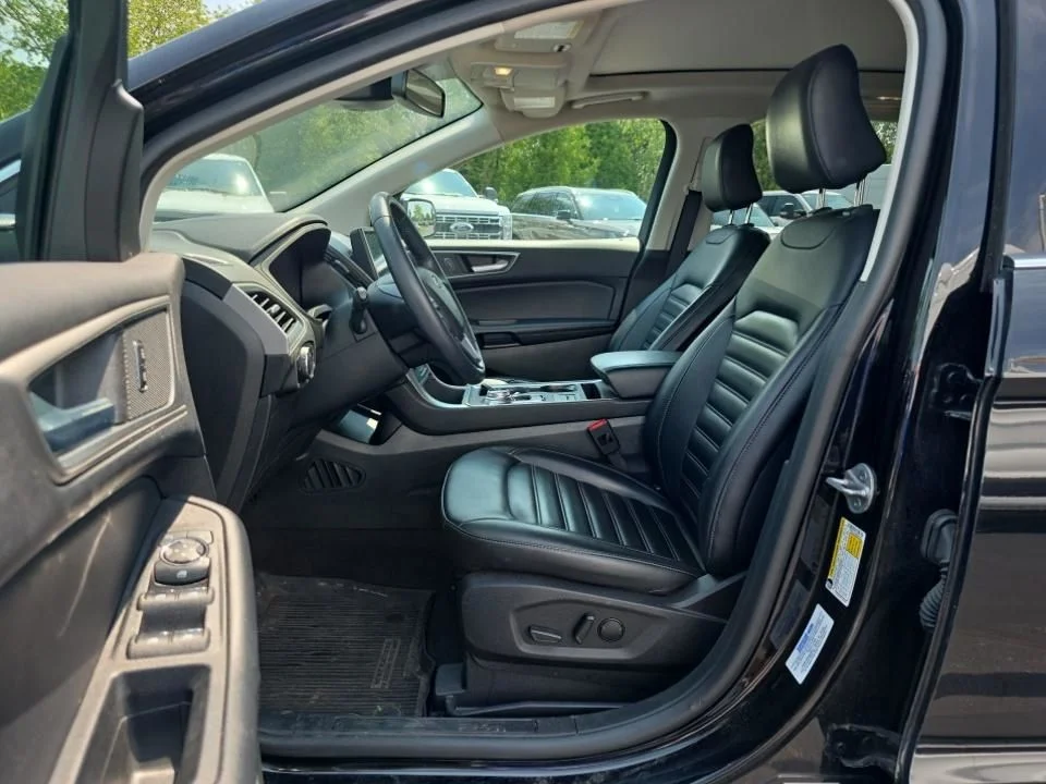 Used 2024 Agate Black Metallic Ford SEL image 4