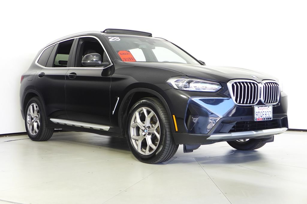 Used 2023 Black Sapphire Metallic BMW sDrive30i image 4