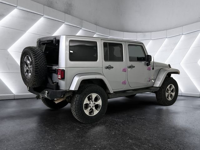 Used 2016 Silver Jeep Unlimited Sahara image 4
