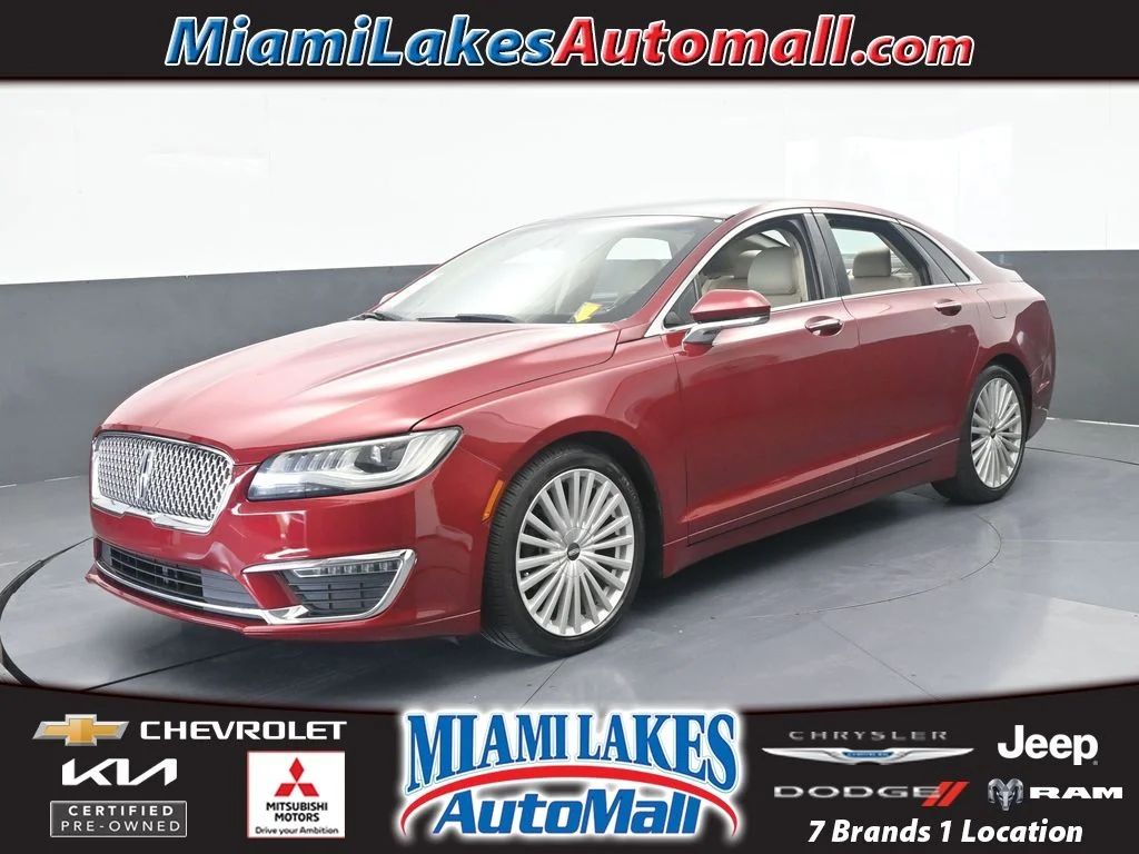 Used 2017 Ruby Red Metallic Lincoln Reserve image 1