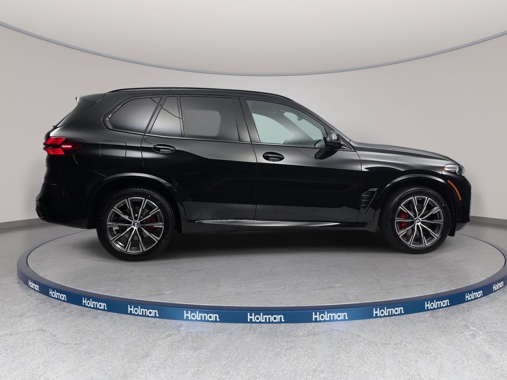New 2026 Black Sapphire Metallic BMW xDrive40i image 4