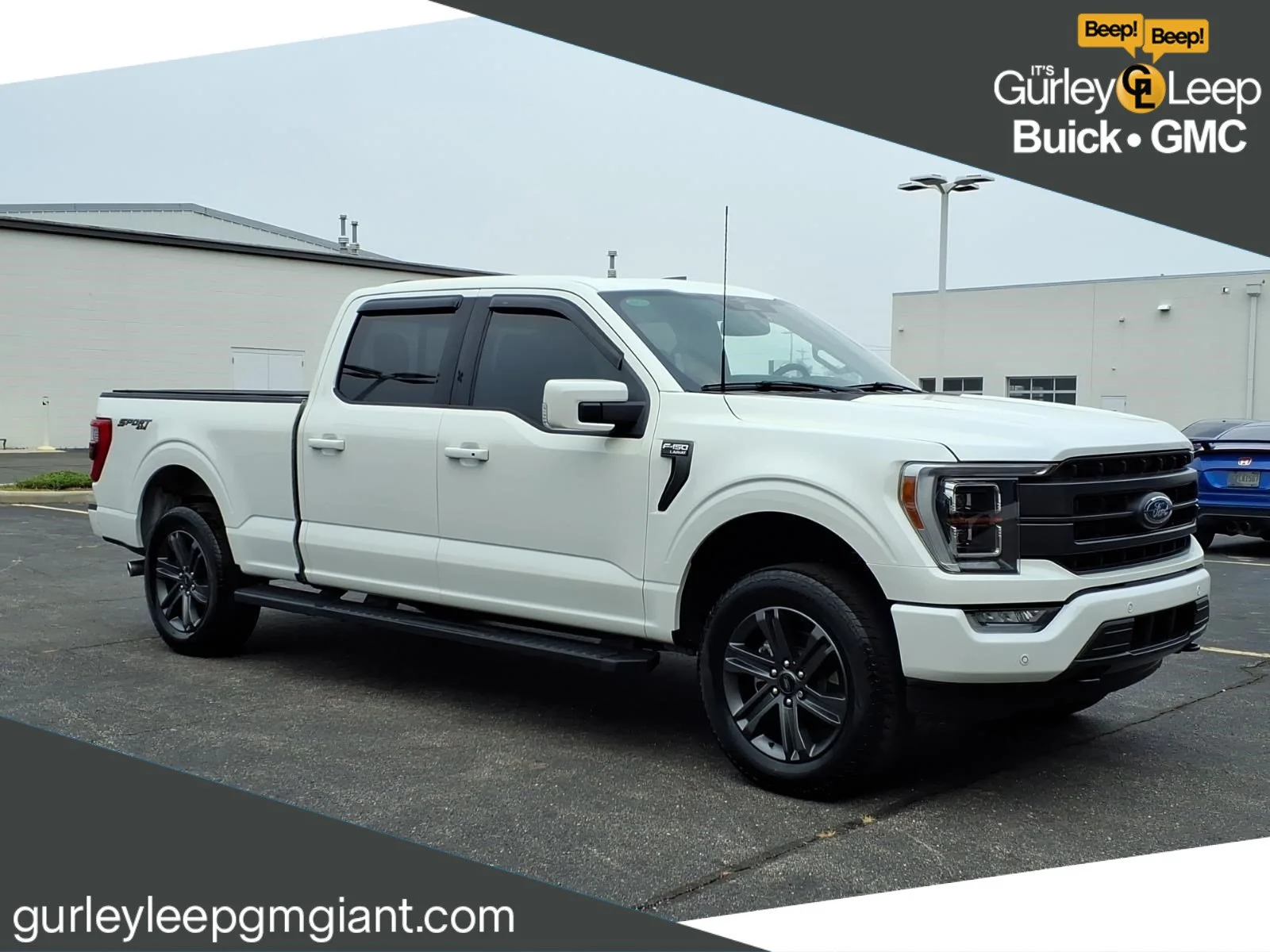 Used 2023 White Metallic Ford LARIAT image 1