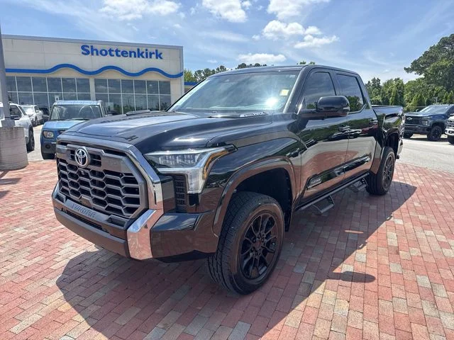 Used 2024 Black Toyota Platinum image 1