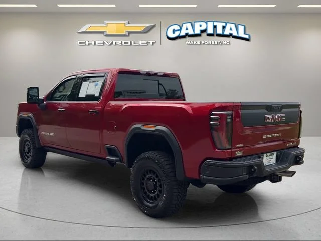 Used 2025 Volcanic Red Tintcoat GMC AT4X image 3