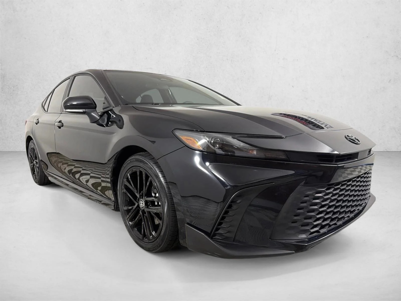 Used 2025 Midnight Black Metallic Toyota SE image 1