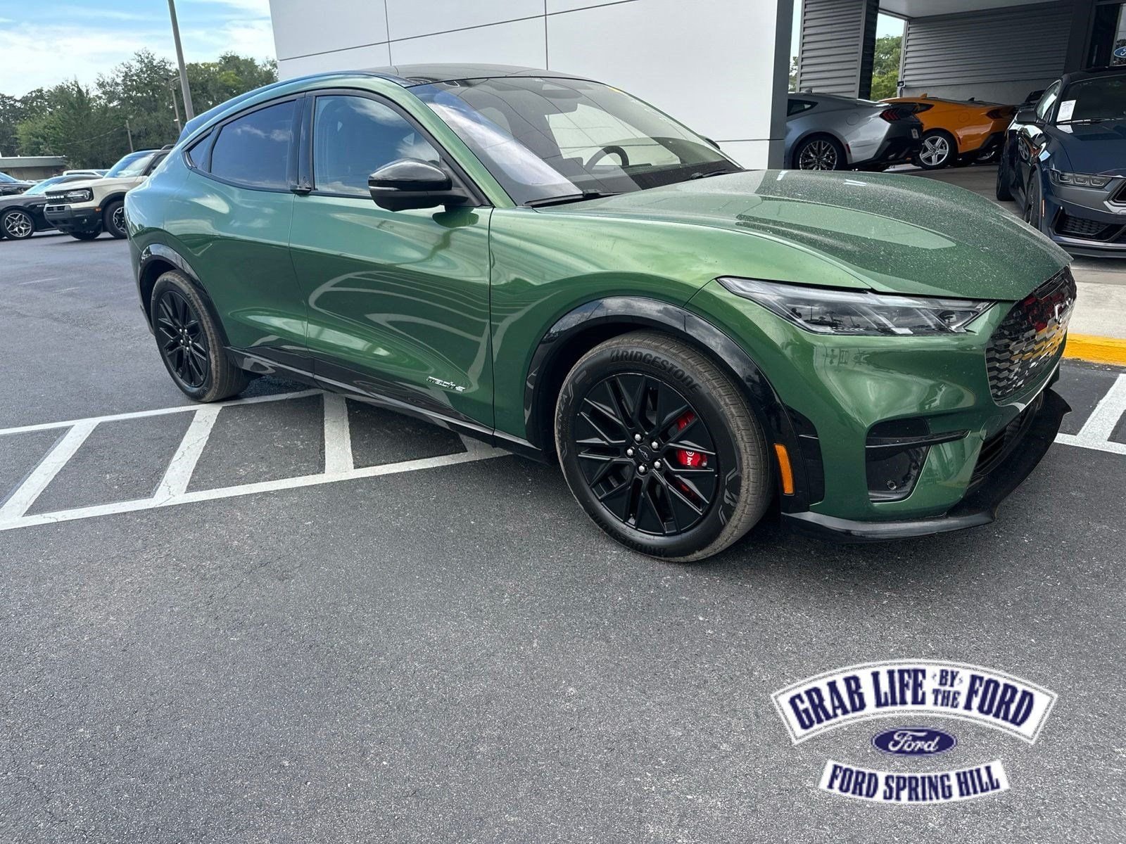 Used 2025 Green Metallic Ford Premium image 1