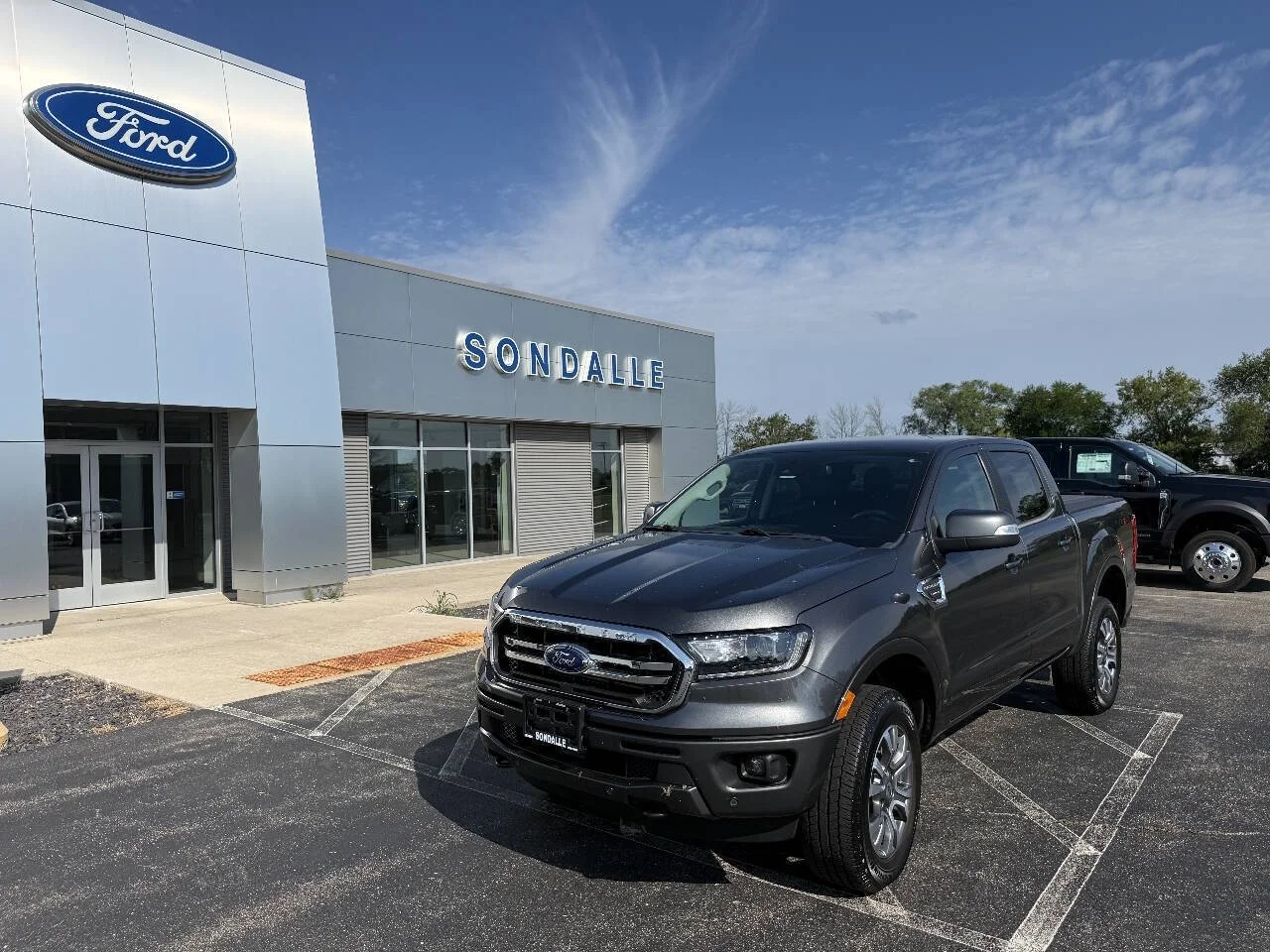 Used 2020 Magnetic Ford Lariat 4x4 4dr SuperCrew 5.1 ft. SB image 1