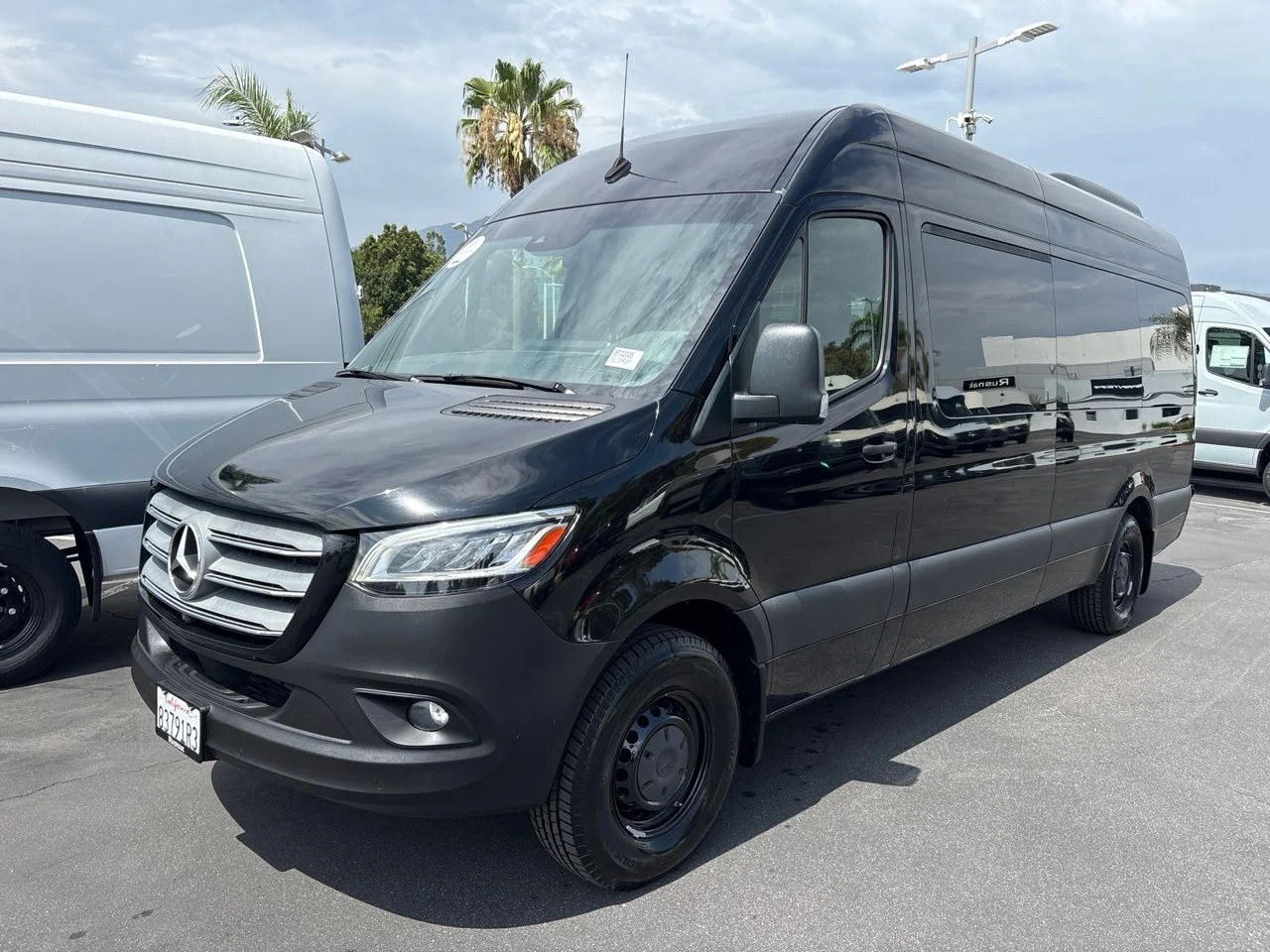 Certified Used 2022 Black Mercedes-Benz Passenger 170 WB High Roof Premium Plus Package image 1