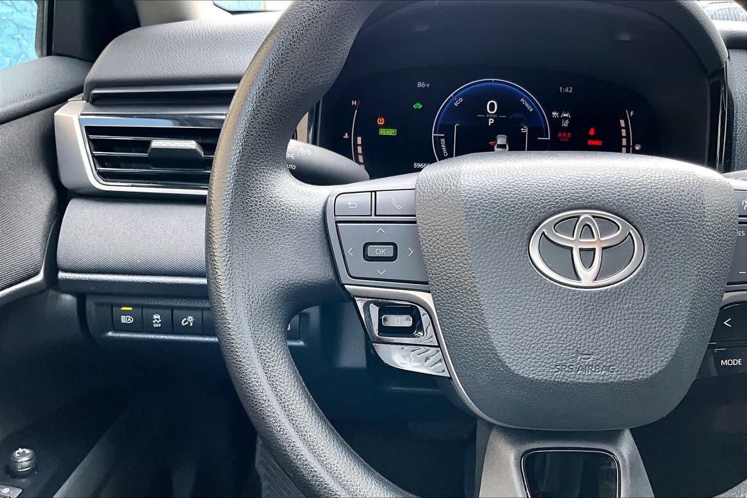Used 2025 Celestial Silver Metallic Toyota LE image 24
