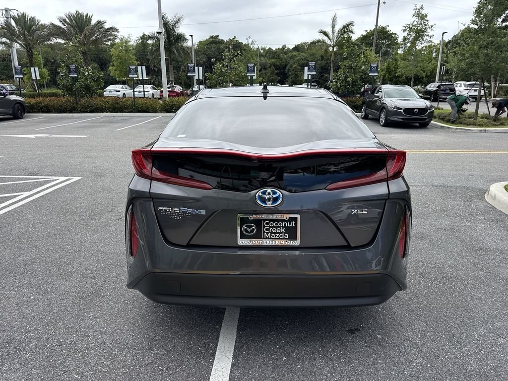 Used 2021 Toyota Prius Prime XLE with VIN JTDKAMFPXM3167259 for sale in Coconut Creek, FL