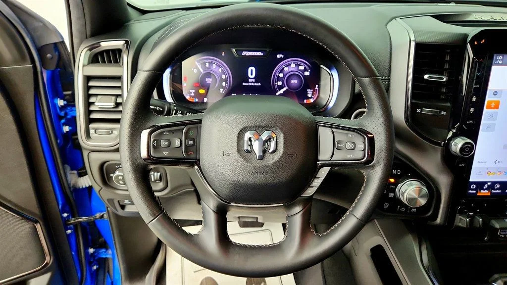 Used 2024 Hydro Blue Pearlcoat Ram Rebel 4x4 Crew Cab 5