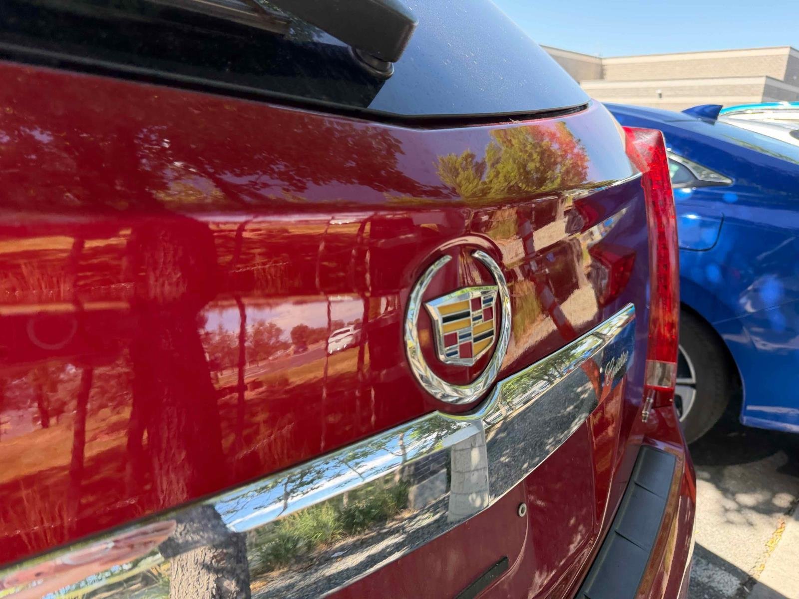 Used 2012 Crystal Red Tintcoat Cadillac Performance Collection image 10