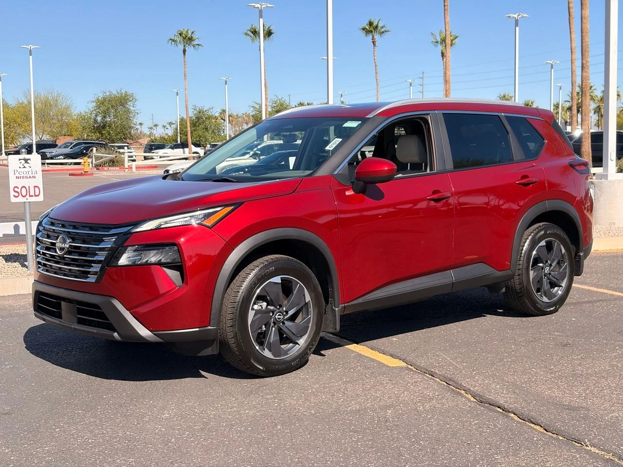 Used 2024 Scarlet Ember Tintcoat Nissan SV image 1