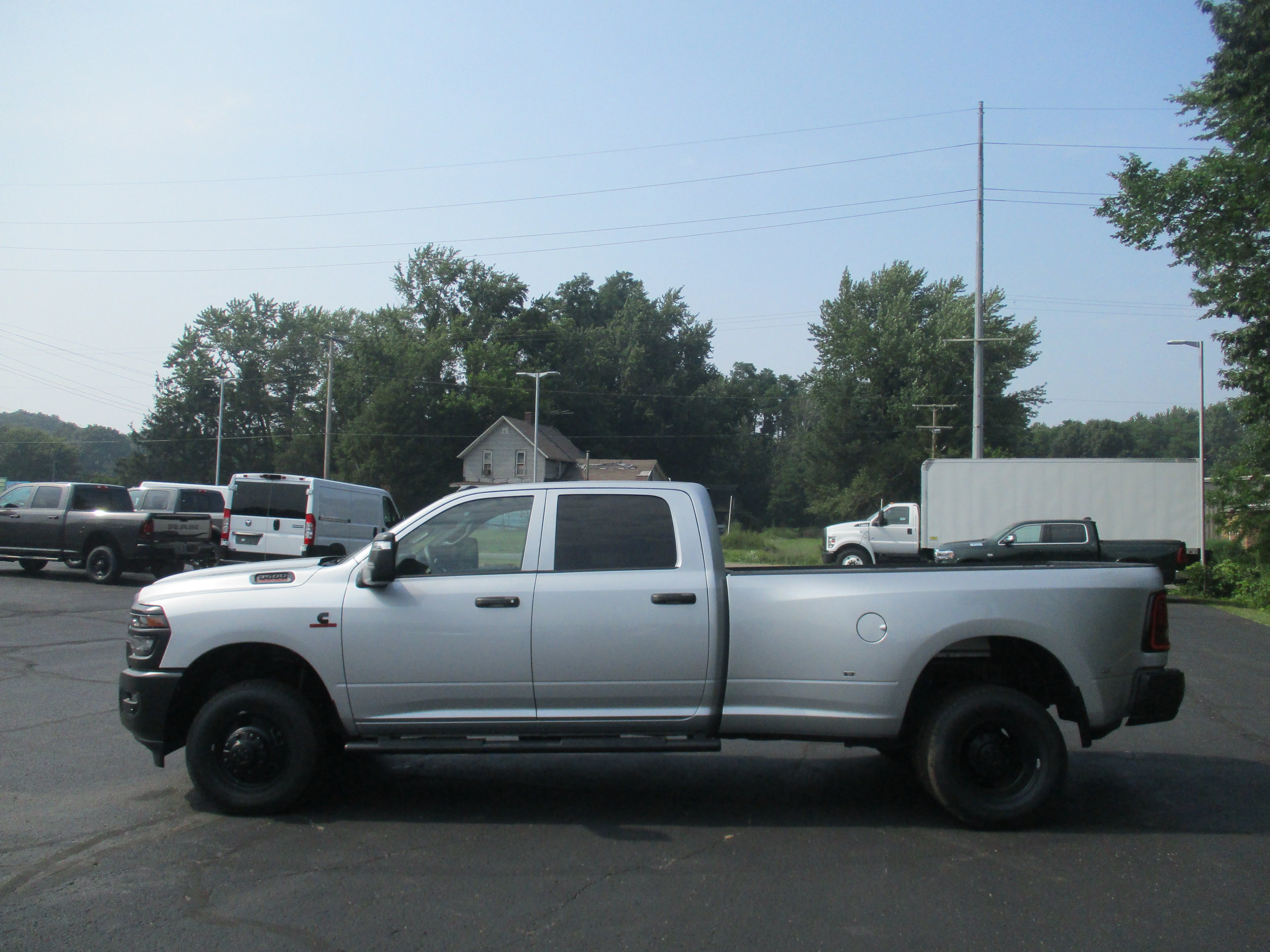 New 2026 Silver-Zynith Exterior Paint RAM Tradesman image 33