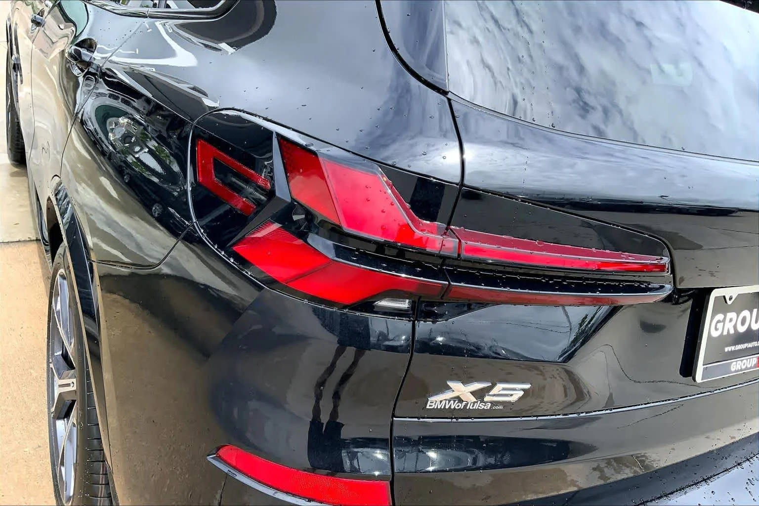 New 2026 Black Sapphire Metallic BMW xDrive50e image 14