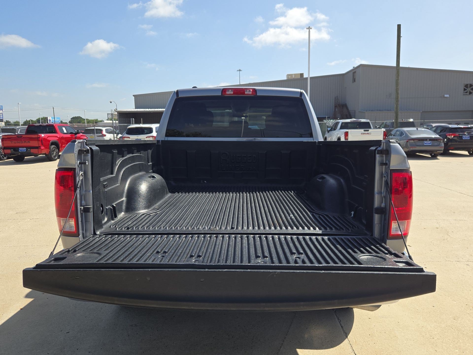 Used 2024 Billet Silver Metallic Clearcoat Ram SLT image 28