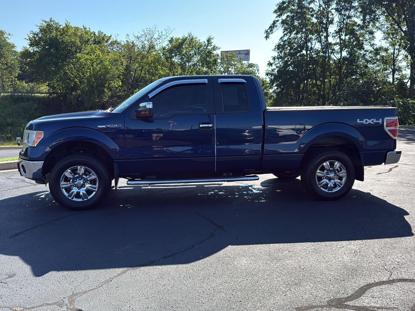 Used 2011 Dark Blue Pearl Metallic Ford Lariat image 2