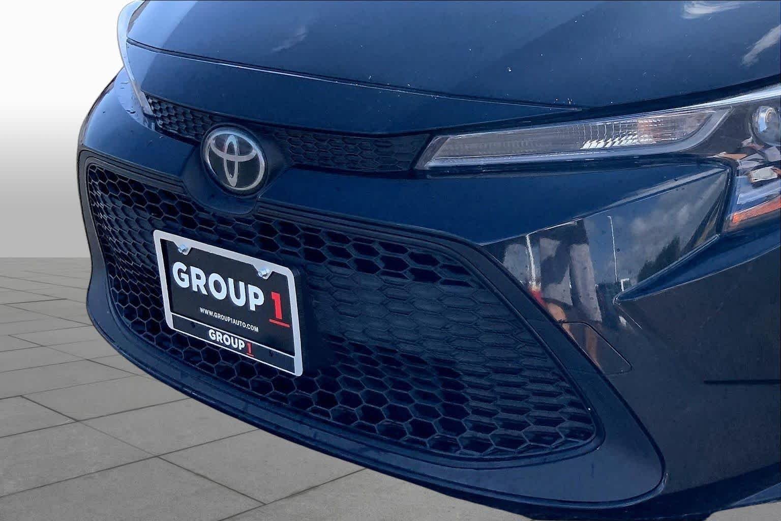 Used 2021 Black Sand Pearl Toyota LE image 30