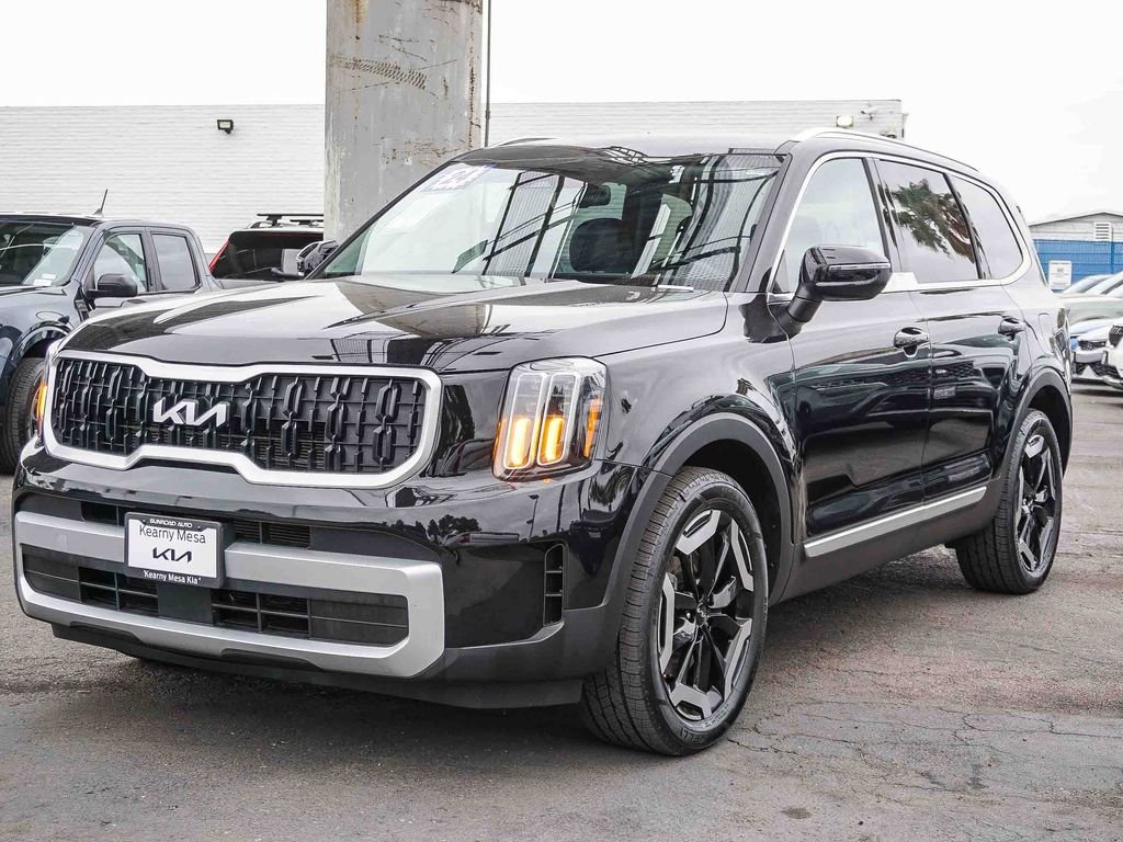 Used 2024 Ebony Black Kia EX image 4