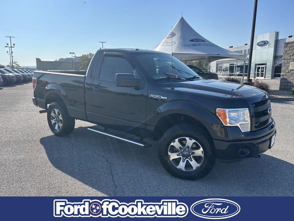 Used 2013 Tuxedo Black Metallic Ford STX image 1