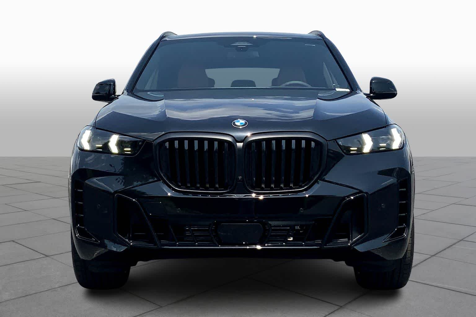 New 2026 Black Sapphire Metallic BMW sDrive40i image 3