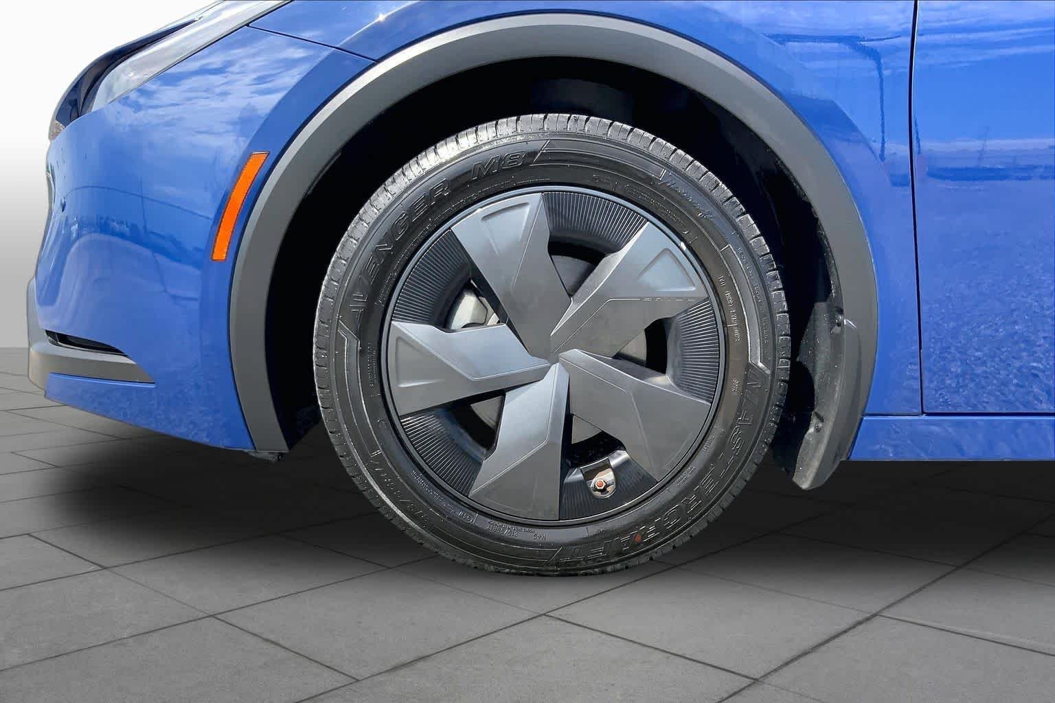 Used 2025 Reservoir Blue Toyota LE image 11