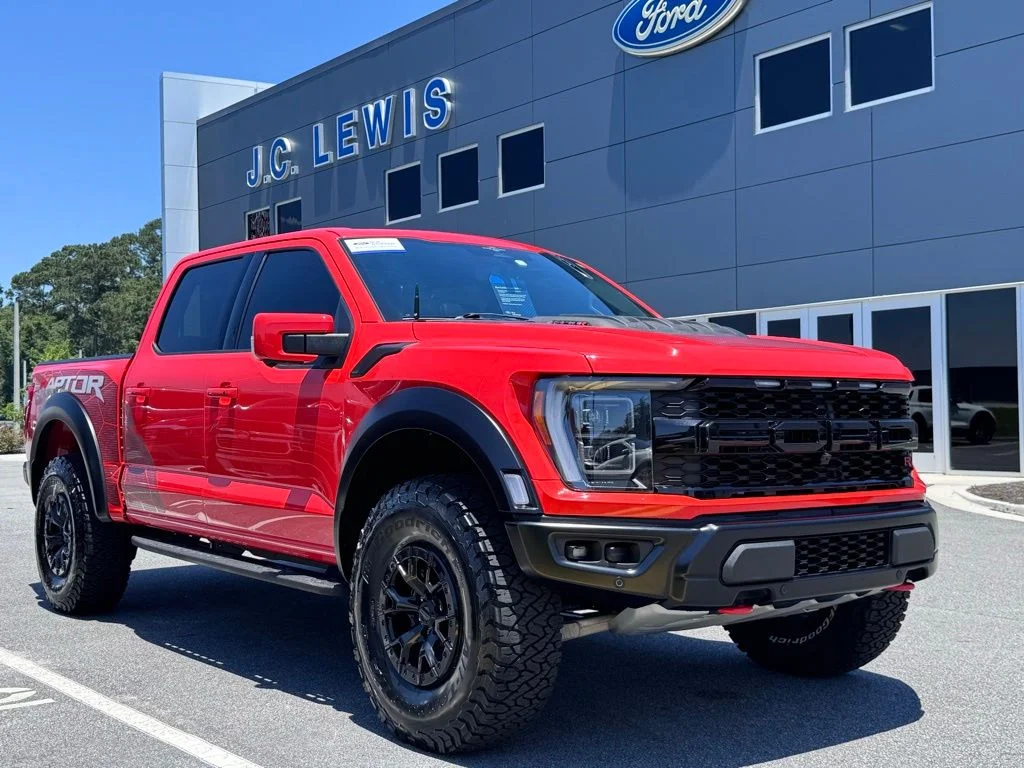 Certified Used 2023 Orange Metallic Ford Raptor image 1