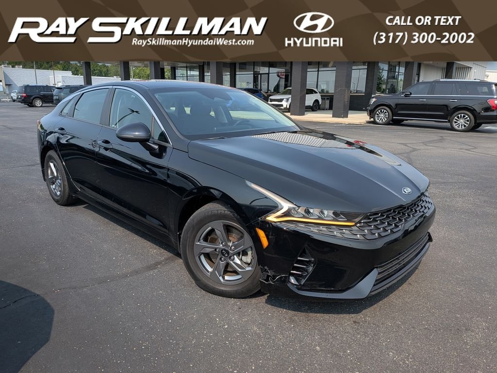 Used 2021 Ebony Black Kia LXS image 1