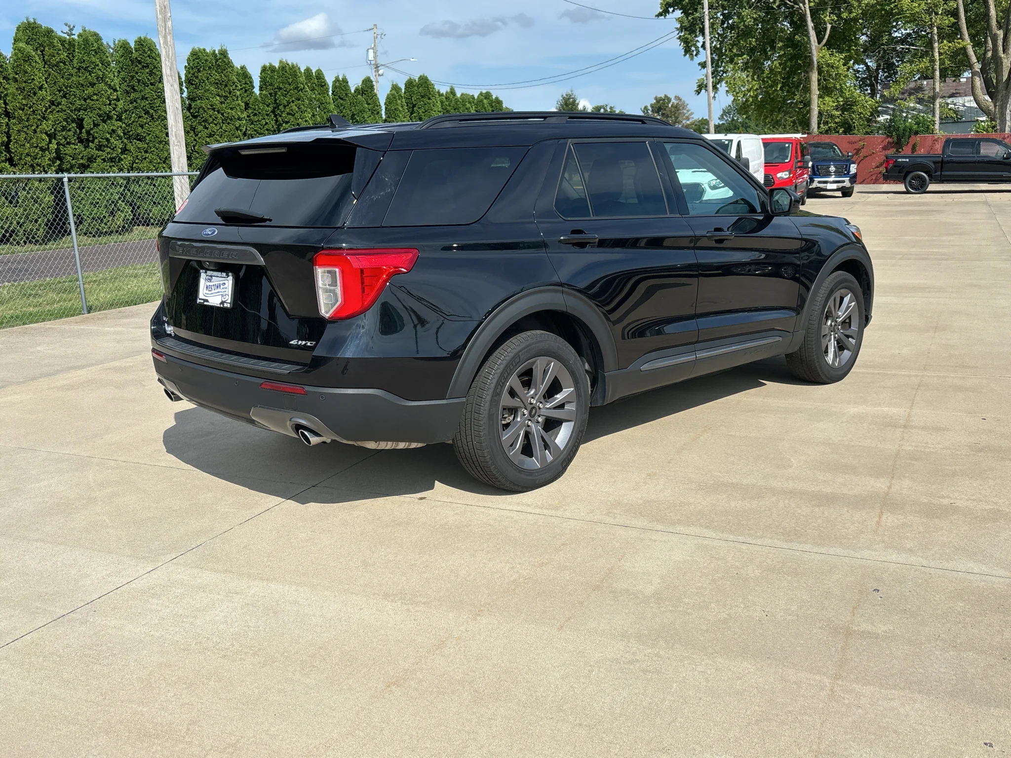 Used 2024 Agate Black Metallic Ford XLT image 4
