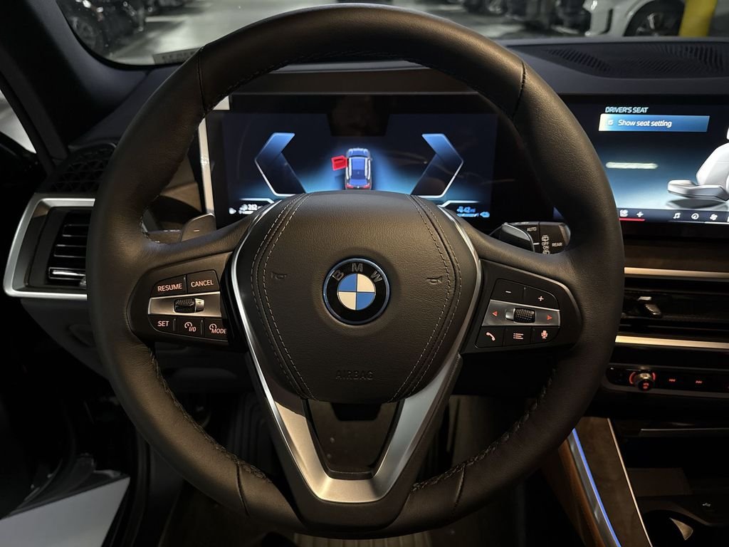 New 2026 Black Sapphire Metallic BMW xDrive50e image 14